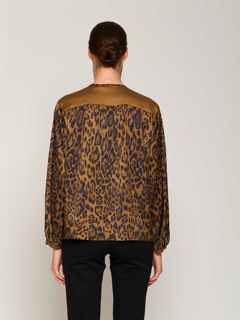 Blusa elegante fantasia animalier