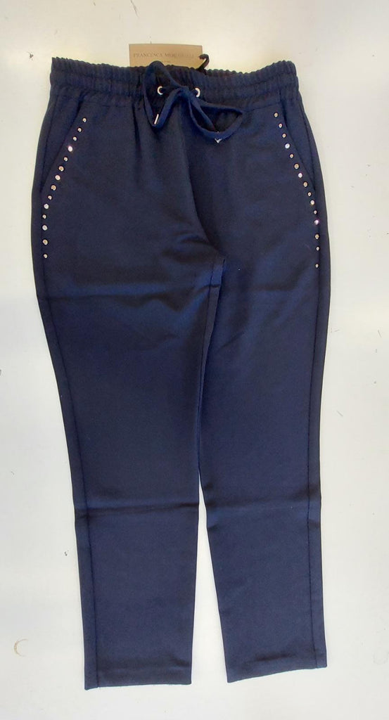 Pantalone in tessuto tecnico tasche con borchie/strass